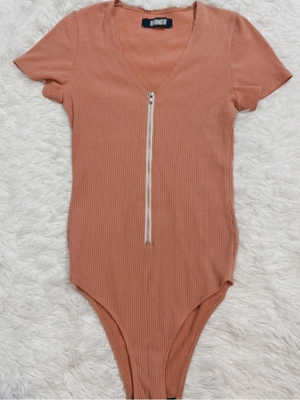Reformation Ribbed Zip-Front Bodysuit in Camel